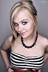 glamour - young blonde woman wearing striped dress