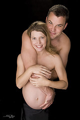 pregnancy - pregnant couple embracing
