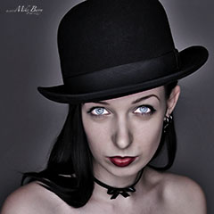 misc - merrick monroe - attractive woman wearing a derby